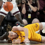 
              Louisiana-Monroe forward Nika Metskhvarishvili (4) passes a loose ball to a teammate against Texas A&M during the second half of an NCAA college basketball game Monday, Nov. 7, 2022, in College Station, Texas. (AP Photo/Sam Craft)
            