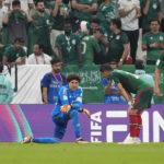 
              Mexico's goalkeeper Guillermo Ochoa, centre, reacts after Saudi Arabia scored during the World Cup group C soccer match between Saudi Arabia and Mexico, at the Lusail Stadium in Lusail, Qatar, Wednesday, Nov. 30, 2022. (AP Photo/Moises Castillo)
            