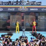 
              From left to right, Ross Chastain, Christopher Bell, Joey Logano and Chase Elliott are introduced to the fans before a NASCAR Cup Series auto race Sunday, Nov. 6, 2022, in Avondale, Ariz. (AP Photo/Rick Scuteri)
            
