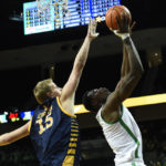 
              UC Irvine center Bent Leuchten (15) defends against Oregon center N'Faly Dante during the first half of an NCAA college basketball game Friday, Nov. 11, 2022, in Eugene, Ore. (AP Photo/Andy Nelson)
            