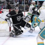 
              Los Angeles Kings goaltender Jonathan Quick (32) blocks a goal attempt by San Jose Sharks right wing Kevin Labanc (62) during the first period of an NHL hockey game Friday, Nov. 25, 2022, in San Jose, Calif. (AP Photo/Tony Avelar)
            