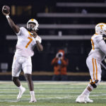 
              Tennessee quarterback Joe Milton III (7) throws a pass during the first half of the team's NCAA college football game against Vanderbilt, Saturday, Nov. 26, 2022, in Nashville, Tenn. (AP Photo/Wade Payne)
            