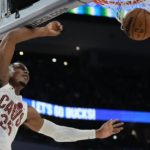 
              Cleveland Cavaliers' Isaac Okoro dunks during the first half of an NBA basketball game Wednesday, Nov. 16, 2022, in Milwaukee. (AP Photo/Morry Gash)
            