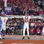 
              Alabama defensive backs DeMarcco Hellams (2) and Brian Branch (14) celebrate after an incomplete fourth-down pass intended for Mississippi wide receiver Jonathan Mingo (1) during the second half of an NCAA college football game in Oxford, Miss., Saturday, Nov. 12, 2022. Alabama won 30-24. (AP Photo/Thomas Graning)
            