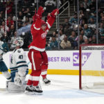 
              Detroit Red Wings left wing David Perron celebrates after against San Jose Sharks goaltender James Reimer (47) during the second period of an NHL hockey game Thursday, Nov. 17, 2022, in San Jose, Calif. (AP Photo/Tony Avelar)
            
