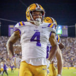 
              LSU running back John Emery Jr. reacts after scoring a touchdown against Alabama in an NCAA college football game in Baton Rouge, La., Saturday, Nov. 5, 2022. LSU won 32-31 in overtime. (Scott Clause/The Daily Advertiser via AP)
            