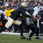 
              Purdue linebacker Jalen Graham (6) tackles Northwestern running back Andrew Clair (11) during the first half of an NCAA college football game in West Lafayette, Ind., Saturday, Nov. 19, 2022. (AP Photo/Michael Conroy)
            