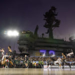 
              Gonzaga guard Julian Strawther (0) grabs a rebound during the second half of the Carrier Classic NCAA college basketball game against Michigan State aboard the USS Abraham Lincoln, Friday, Nov. 11, 2022, in Coronado, Calif. (AP Photo/Gregory Bull)
            