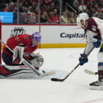 
              Washington Capitals goaltender Darcy Kuemper (35) makes a save against Colorado Avalanche right wing Martin Kaut (61) during the second period of an NHL hockey game Saturday, Nov. 19, 2022, in Washington. (AP Photo/Jess Rapfogel)
            