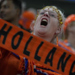 
              A Dutch supporter cheers before the World Cup, group A soccer match between Senegal and Netherlands at the Al Thumama Stadium in Doha, Qatar, Monday, Nov. 21, 2022. (AP Photo/Ricardo Mazalan)
            