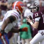 
              Texas A&M quarterback Haynes King (13) looks to pass down field against Florida during the second quarter of an NCAA college football game Saturday, Nov. 5, 2022, in College Station, Texas. (AP Photo/Sam Craft)
            