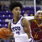 
              TCU guard PJ Haggerty (3) looks to pass the ball as Louisiana-Monroe guard Tyreke Locure (11) defends during the first half of an NCAA college basketball game Thursday, Nov. 17, 2022, in Fort Worth, Texas. (AP Photo/Ron Jenkins)
            