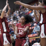 
              Stanford guard Indya Nivar (12) and teammates celebrate from the bench after a score during the second half of an NCAA college basketball game against Pacific in Stockton, Calif., Friday, Nov. 11, 2022. (AP Photo/Godofredo A. Vásquez)
            
