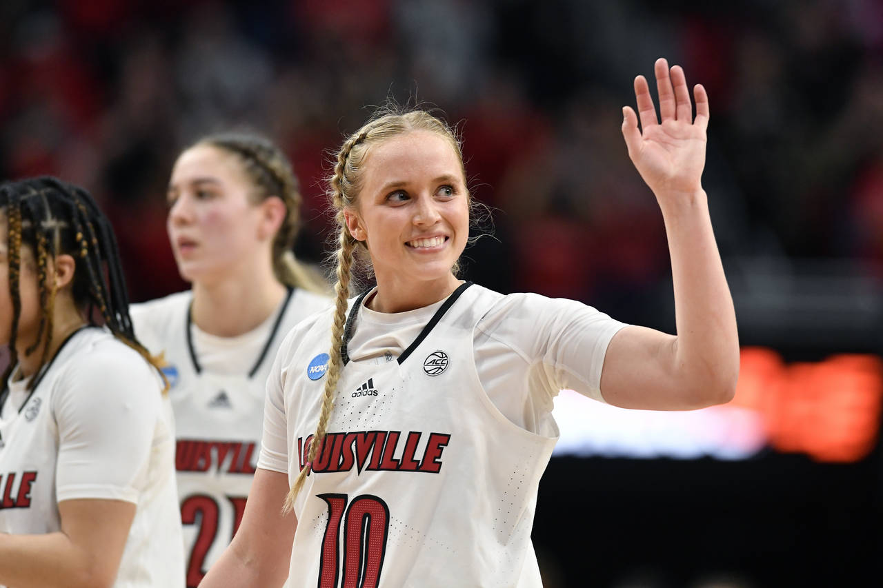 FILE - Louisville guard Hailey Van Lith (10) waves to the crowd at the end of a women's NCAA tourna...