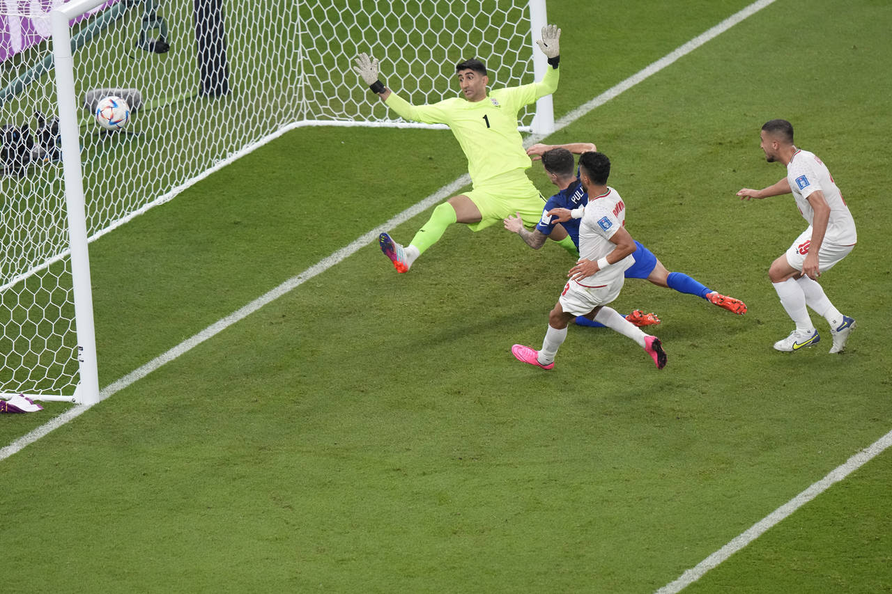 Christian Pulisic of the United States scores his side's opening goal during the World Cup group B ...