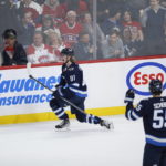 
              Winnipeg Jets' Kyle Connor (81) celebrates his overtime goal against the Montreal Canadiens during an NHL hockey game Thursday, Nov. 3, 2022, in Winnipeg, Manitoba. (John Woods/The Canadian Press via AP)
            