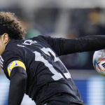 
              Mexico goalkeeper Guillermo Ochoa passes the ball during the second half of an international friendly soccer match against Colombia in Santa Clara, Calif., Tuesday, Sept. 27, 2022. (AP Photo/Godofredo A. Vásquez)
            