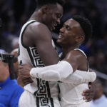 
              Michigan State center Mady Sissoko, left, celebrates with teammate Tyson Walker, right, after their overtime win over Kentucky in an NCAA college basketball game, Tuesday, Nov. 15, 2022, in Indianapolis. (AP Photo/Darron Cummings)
            
