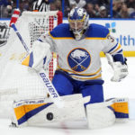 
              Buffalo Sabres goaltender Eric Comrie (31) makes a save on a shot by the Tampa Bay Lightning during the second period of an NHL hockey game Saturday, Nov. 5, 2022, in Tampa, Fla. (AP Photo/Chris O'Meara)
            