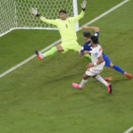 
              Christian Pulisic of the United States scores his side's opening goal during the World Cup group B soccer match between Iran and the United States at the Al Thumama Stadium in Doha, Qatar, Tuesday, Nov. 29, 2022. (AP Photo/Luca Bruno)
            