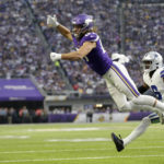 
              Minnesota Vikings tight end T.J. Hockenson (87) looks to catch a pass ahead of Dallas Cowboys safety Donovan Wilson (6) during the first half of an NFL football game, Sunday, Nov. 20, 2022, in Minneapolis. The pass was incomplete. (AP Photo/Andy Clayton-King)
            