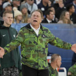 
              Michigan State head coach Tom Izzo reacts during the first half of the Carrier Classic NCAA college basketball game against Gonzaga aboard the USS Abraham Lincoln, Friday, Nov. 11, 2022, in Coronado, Calif. (AP Photo/Gregory Bull)
            