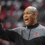 
              Louisville head coach Kenny Payne shouts instructions to his team during the first half of an NCAA college basketball game against Bellarmine in Louisville, Ky., Wednesday, Nov. 9, 2022. (AP Photo/Timothy D. Easley)
            