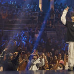 
              People cheer as Yuki Minatozaki, also known as B-Boy Yu-Ki, salutes during the B-boy Red Bull BC One World Final at Hammerstein Ballroom on Saturday, Nov. 12, 2022, in Manhattan, New York. The International Olympic Committee announced two years ago that breaking would become an official Olympic sport, a development that divided the breaking community between those excited for the larger platform and those concerned about the art form’s purity.  (AP Photo/Andres Kudacki)
            