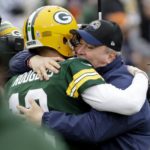 
              Green Bay Packers quarterback Aaron Rodgers (12) and Dallas Cowboys head coach Mike McCarthy, right, greet each other during warmups before an NFL football game Sunday, Nov. 13, 2022, in Green Bay, Wis. (AP Photo/Mike Roemer)
            