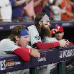 
              The Philadelphia Phillies watch the Houston Astros celebrate their 4-1 World Series win against the Philadelphia Phillies in Game 6 on Saturday, Nov. 5, 2022, in Houston. (AP Photo/Tony Gutierrez)
            