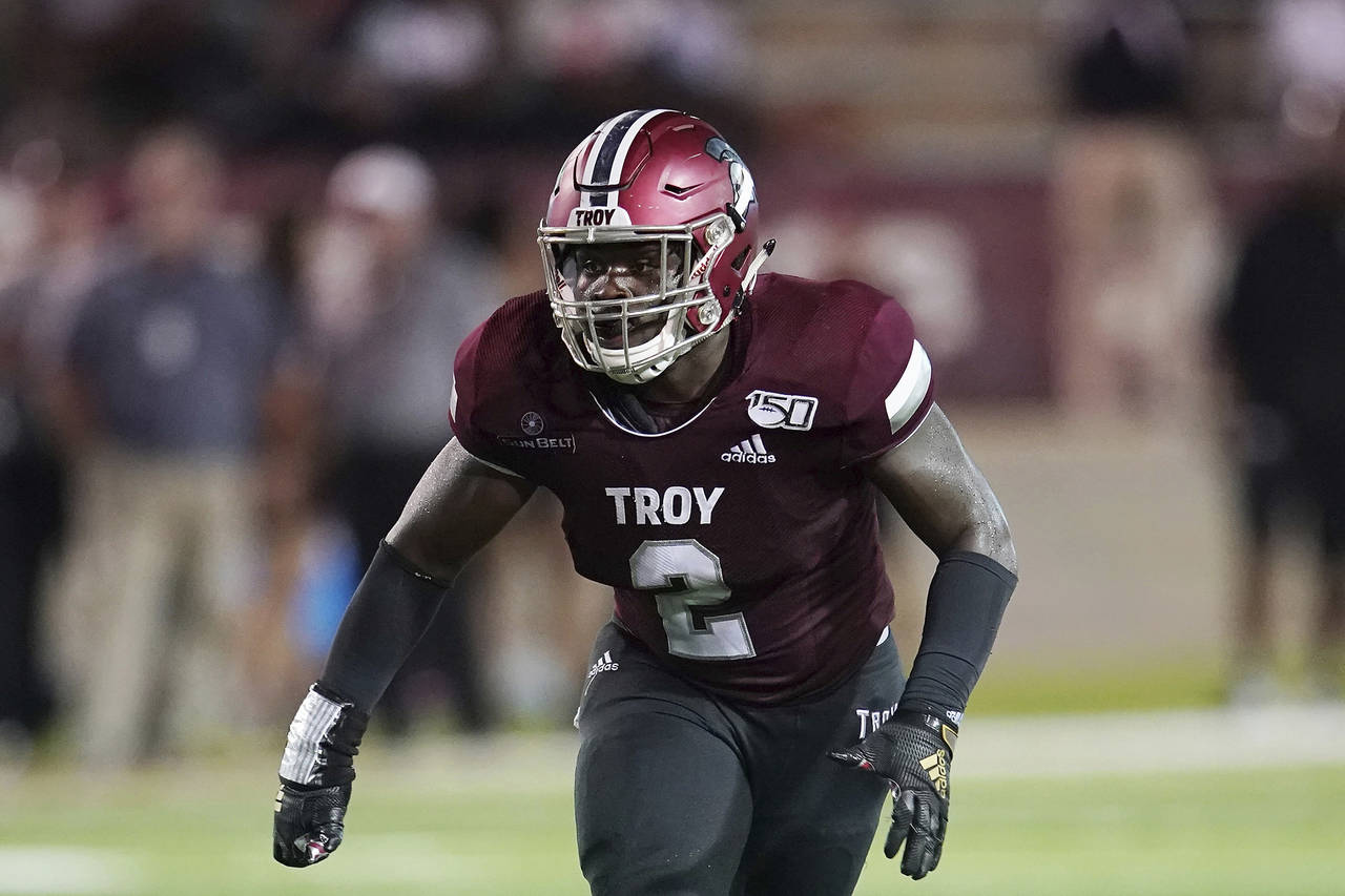 FILE - Troy linebacker Carlton Martial (2) plays during an NCAA college football game in Troy, Ala....