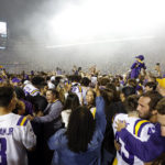 
              Fans storm the field after an NCAA college football game between LSU and Alabama in Baton Rouge, La., Saturday, Nov. 5, 2022. (AP Photo/Tyler Kaufman)
            