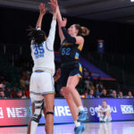 
              In a photo provided by Bahamas Visual Services, Maquette's Chole Marotta (52) goes up against UCLA's Camryn Brown (35) during the NCAA college basketball championship game in the Battle 4 Atlantis at Paradise Island, Bahamas, Monday, Nov. 21, 2022. (Tim Aylen/Bahamas Visual Services via AP)
            