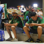
              Mexico supporters sit outside Lusail Stadium following following Argentina's 2-0 victory over Mexico in a World Cup group C soccer match in Lusail, Qatar, Suday, Nov. 27, 2022. (AP Photo/Julio Cortez)
            
