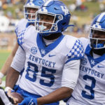 
              Kentucky tight end Jordan Dingle, center, celebrates his touchdown with teammate Dekel Crowdus, right, during the third quarter of an NCAA college football game against Missouri, Saturday, Nov. 5, 2022, in Columbia, Mo. (AP Photo/L.G. Patterson)
            
