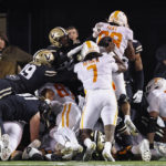 
              Tennessee tight end Princeton Fant (88) is shoved over the goal line by quarterback Joe Milton III (7) for a touchdown against Vanderbilt during the first half of an NCAA college football game Saturday, Nov. 26, 2022, in Nashville, Tenn. (AP Photo/Wade Payne)
            