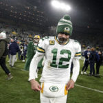 
              Green Bay Packers quarterback Aaron Rodgers (12) walks off the field after the team's NFL football game against the Tennessee Titans Thursday, Nov. 17, 2022, in Green Bay, Wis. (AP Photo/Morry Gash)
            