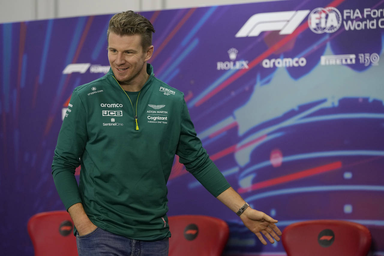 FILE - Aston Martin driver Nico Hulkenberg of Germany gestures during a press conference at the For...