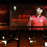 
              South Korean soccer player Son Heung-min is seen on a screen during a press conference to announce the South Korean squad for the Qatar 2022 World Cup in Seoul, South Korea, Saturday, Nov. 12, 2022. (AP Photo/Ahn Young-joon)
            