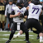 
              Northwestern quarterback Cole Freeman throws against Purdue during the first half of an NCAA college football game in West Lafayette, Ind., Saturday, Nov. 19, 2022. (AP Photo/Michael Conroy)
            