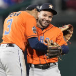 
              Houston Astros second baseman Jose Altuve and shortstop Jeremy Pena celebrate their win in Game 5 of baseball's World Series between the Houston Astros and the Philadelphia Phillies on Friday, Nov. 4, 2022, in Philadelphia. The Astros won 3-2, to take a one game lead in the best of seven series. (AP Photo/David J. Phillip)
            