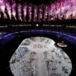 
              FILE - Fireworks are seen during the opening ceremony at the Olympic Stadium at the 2020 Summer Olympics, Friday, July 23, 2021, in Tokyo.  Creative director Marco Balich, reveals to The Associated Press that he has been working for a year on a 30-minute show that will run ahead of the Soccer World Cup 2022 opening game between Qatar and Ecuador. He says local organizers "wanted to create a real show, which FIFA is not accustomed to.” (AP Photo/Morry Gash, File)
            