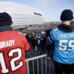 
              A crowd of fans arrive for a NFL match between Tampa Bay Buccaneers and Seattle Seahawks at the Allianz Arena in Munich, Germany, Sunday, Nov. 13, 2022. (AP Photo/Markus Schreiber)
            