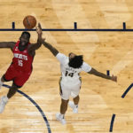 
              Houston Rockets forward Usman Garuba (16) battles under the basket against New Orleans Pelicans forward Brandon Ingram (14) in the first half of an NBA basketball game in New Orleans, Saturday, Nov. 12, 2022. (AP Photo/Gerald Herbert)
            
