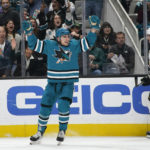 
              San Jose Sharks right wing Timo Meier celebrates a goal by Kevin Labanc, next to Anaheim Ducks center Isac Lundestrom (21) during the first period of an NHL hockey game in San Jose, Calif., Saturday, Nov. 5, 2022. (AP Photo/Jeff Chiu)
            