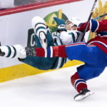 
              San Jose Sharks' Timo Meier, left, is checked by Montreal Canadiens' Kaiden Guhle during the second period of an NHL hockey game Tuesday, Nov. 29, 2022, in Montreal. (Paul Chiasson/The Canadian Press via AP)
            