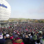 
              A crowd of thousands of people wait in front of the stadium prior to NFL match between Tampa Bay Buccaneers and Seattle Seahawks at the Allianz Arena in Munich, Germany, Sunday, Nov. 13, 2022. (AP Photo/Markus Schreiber)
            