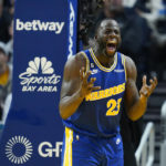 
              Golden State Warriors forward Draymond Green reacts during the first half of an NBA basketball game against the San Antonio Spurs in San Francisco, Monday, Nov. 14, 2022. (AP Photo/Godofredo A. Vásquez)
            