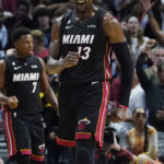 
              Miami Heat center Bam Adebayo (13) reacts after scoring during the second half of an NBA basketball game against the Phoenix Suns, Monday, Nov. 14, 2022, in Miami. (AP Photo/Marta Lavandier)
            