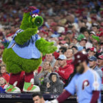 
              The Philly Phanatic walks on the dugout during the eighth inning in Game 5 of baseball's World Series between the Houston Astros and the Philadelphia Phillies on Thursday, Nov. 3, 2022, in Philadelphia. (AP Photo/Matt Slocum)
            